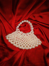 Off-white handmade beaded bag with premium beads and long strap for versatile wear